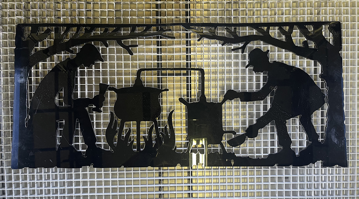 Laserskärning svart plexi